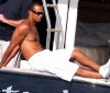 Tiger Woods Relaxes with Man Boobs