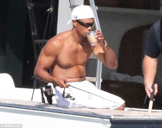 Tiger Woods Takes Cool Drink